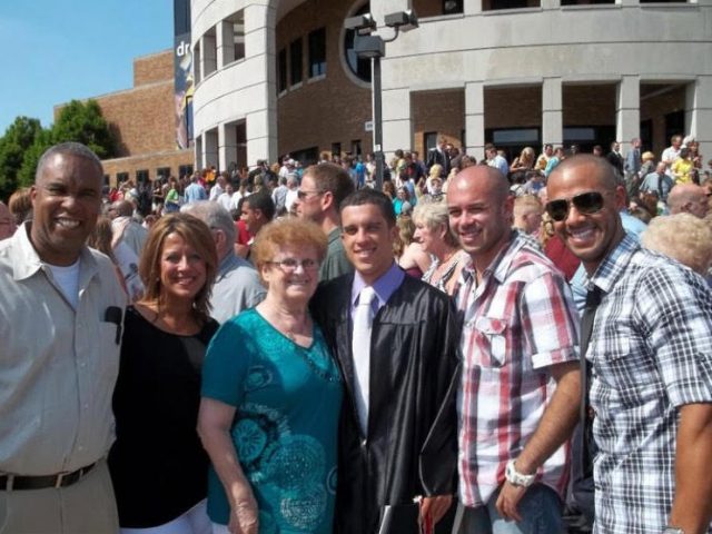 Deborah Thomas and family celebrating her grandson graduating from college