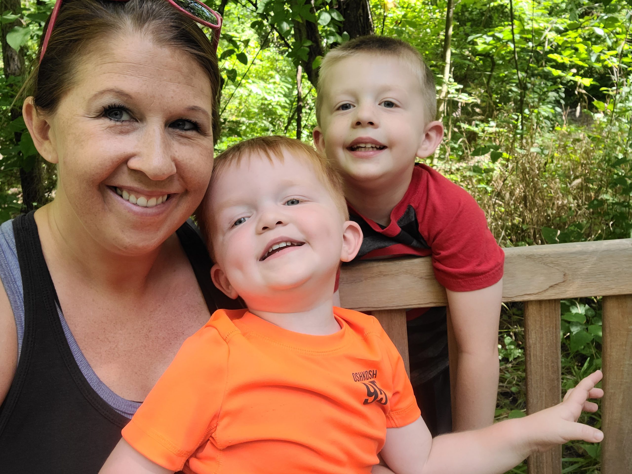 Kim Zaayer and her sons on the park bench