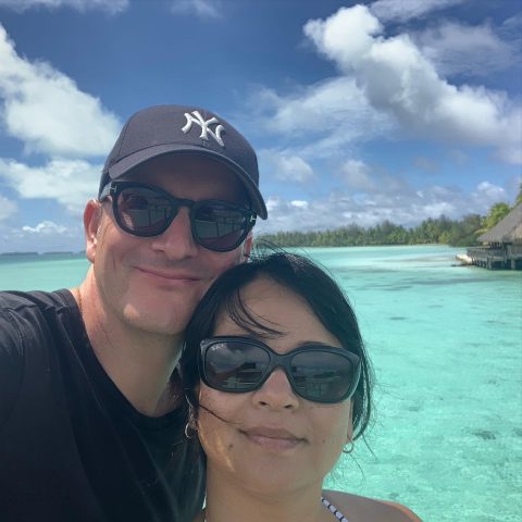 Sylvia Kumi Christopolous with her husband along the Middle American ocean