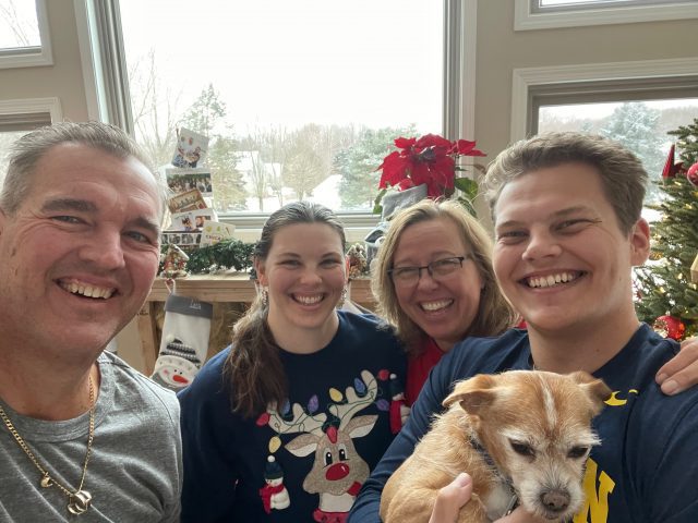 Lisa Petersmark with her family and their family dog at Christmas