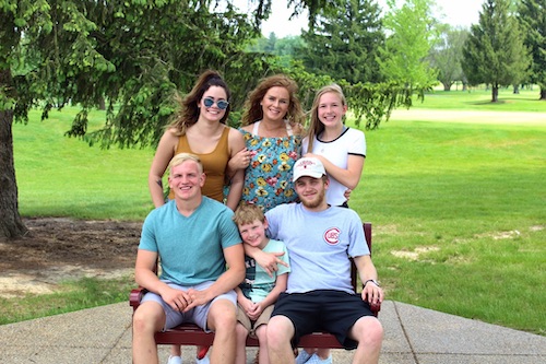 Leslie Olston and her family at a park bench