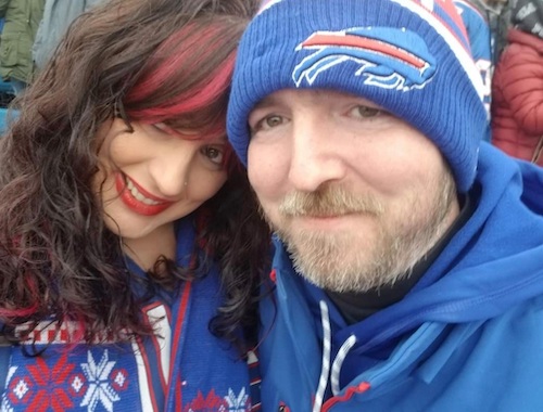 Bob and Alanna Hetzel hanging out at the Bills game wearing their cold weather gear
