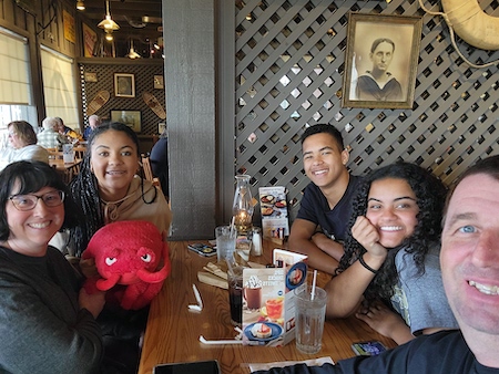 Michelle Coker and her family eating at Cracker Barrel
