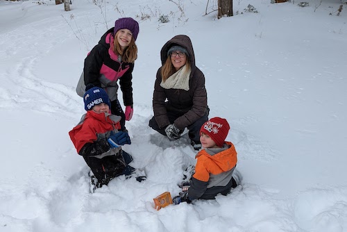 Michelle Bontius and her kids playing in the snow