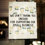 sign that says, "we can't thank you enough for supporting our small business"