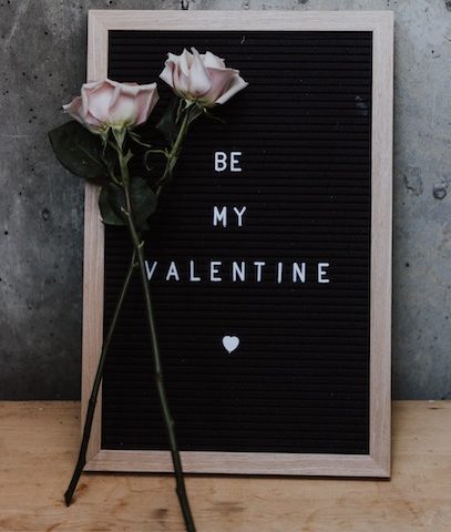 Be My Valentine board with roses in front