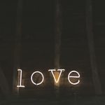 neon lights spelling out love - for the definition of love blog post