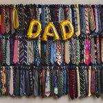 A bunch of neckties and a Dad balloon