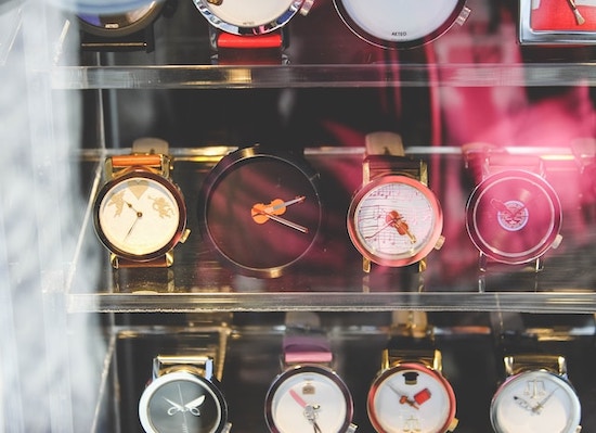 Watches in a store window.