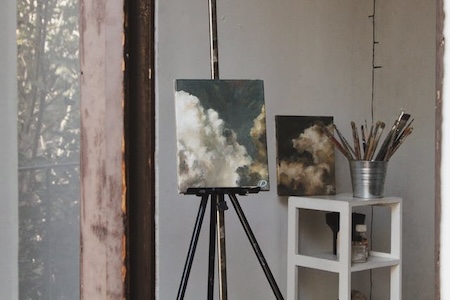 A painting of a cloud near a window